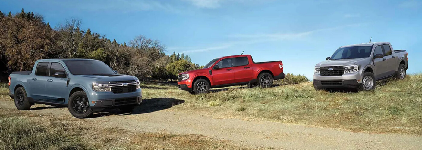 3 trucks a dodge ram, chevy silverado, and ford f150
